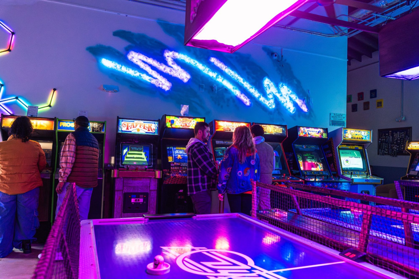 Neon air hockey tables